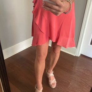 New with tags. Beautiful coral wrap skirt, xs petite. Flattering and feminine.